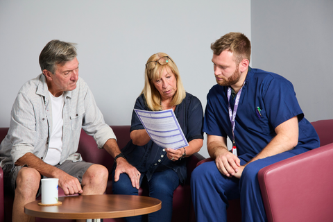 healthcare professional going through a ReSPECT form with a couple