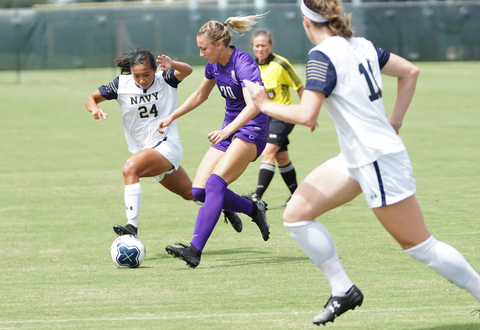 womens community football team during a game