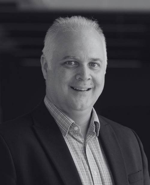 black and white headshot of Gavin Perkins