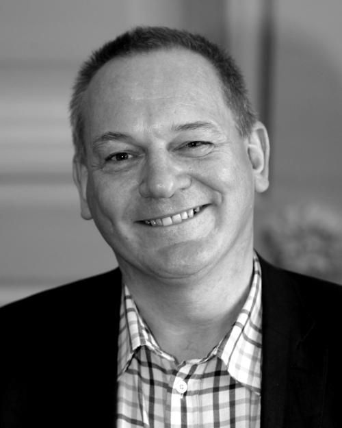 black and white headshot of Ian Maconochie