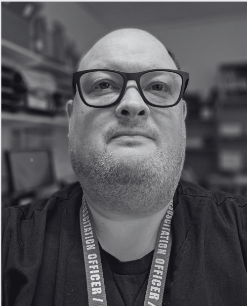 black and white headshot of James Bolton