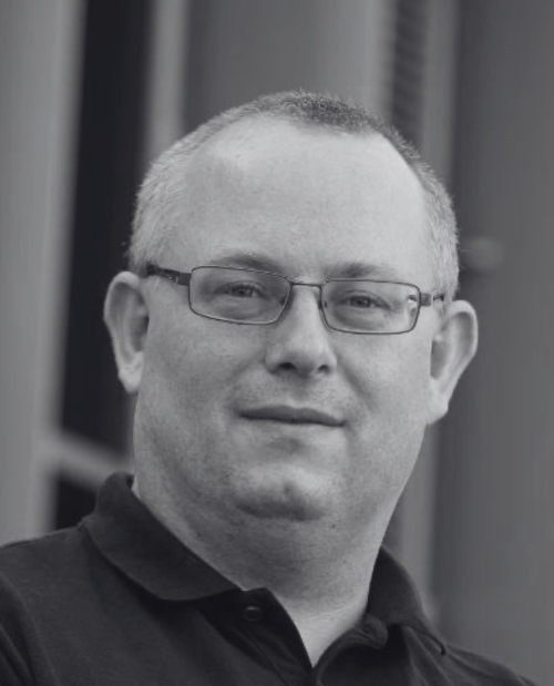 black and white headshot of Keith Couper
