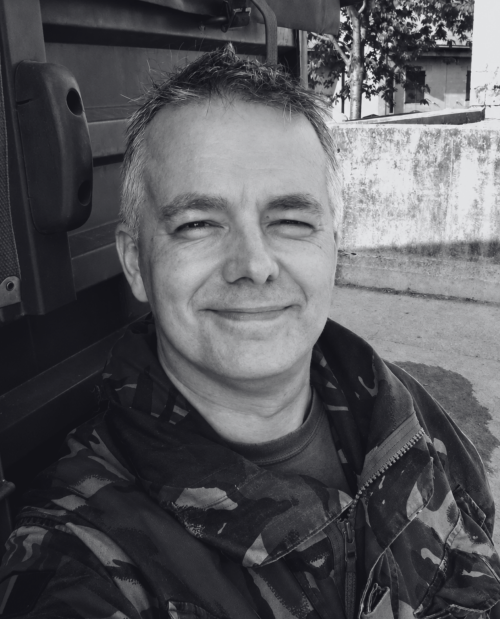 black and white headshot of Paul Darling-Wills