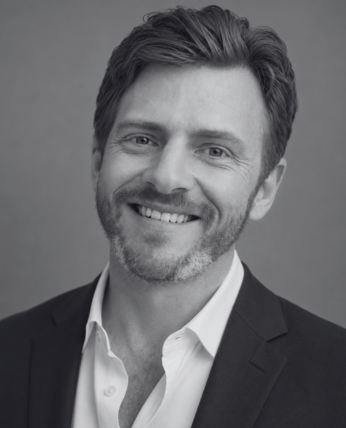 black and white headshot of Rupert Parker