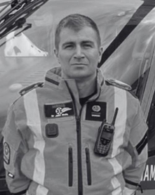 Black and white headshot of John Walls