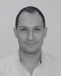 black and white headshot of Adam Benson Clarke