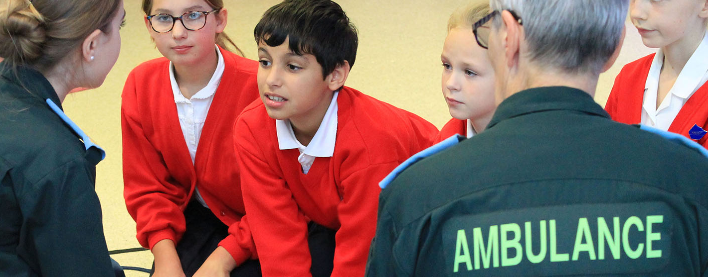 Children learning CPR