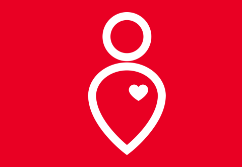 A person with a graphic of a heart on a red background.