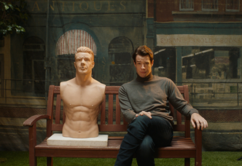 Connor Swindells next to a CPR manikin modeled after himself
