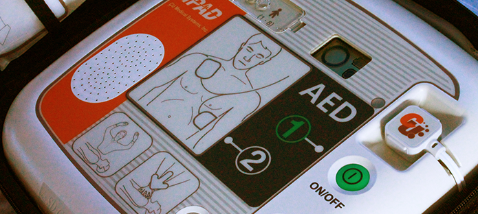 A close up of a trained AED