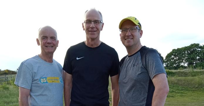 Image of Tony with running buddies who saved his life