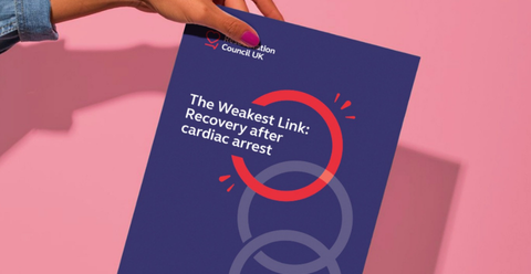person holding a copy of The Weakest Link: Recovery after cardiac arrest report