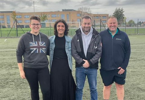 Alan with loved ones on the football pitch